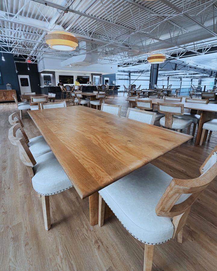 Dining tables and chairs on the Greystone mezzanine overlooking the courts