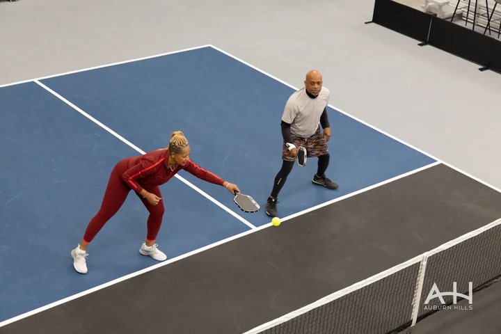 City of Auburn Hills photo: two players at the net on a Greystone court